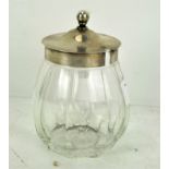 A silver topped cut glass pot,