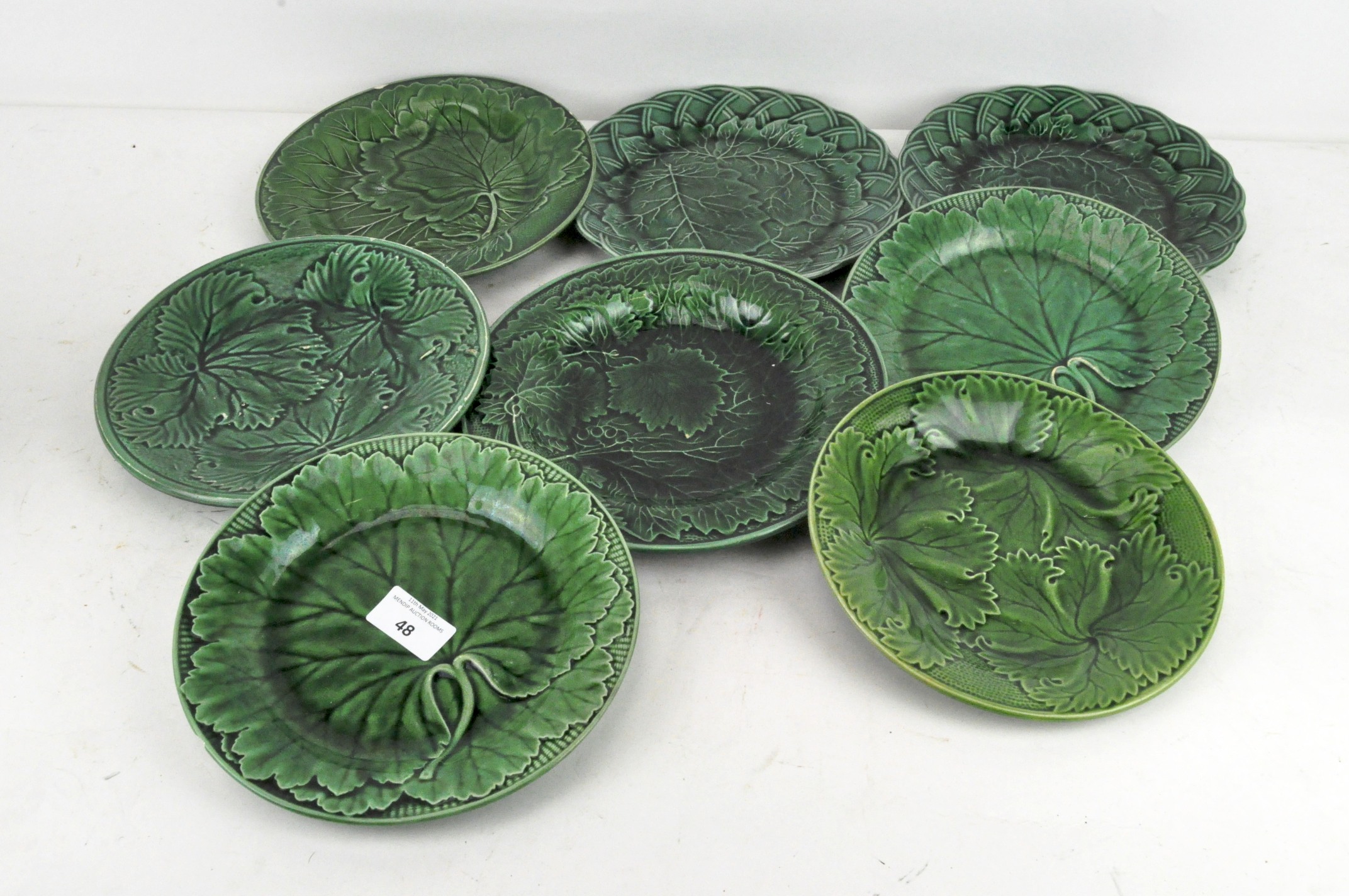 Eight majolica 'Green Leaf' plates,