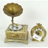 A novelty musical lighter in the form of a gramophone;