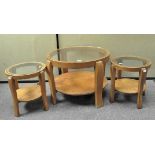 An Art Deco coffee table, of circular form; together with two matching side tables,