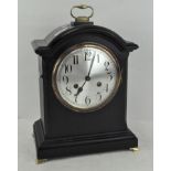 A 20th century mantel clock, the movement stamped Junghans,