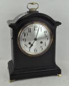 A 20th century mantel clock, the movement stamped Junghans,