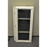 A vintage white painted glazed tabletop display cabinet,