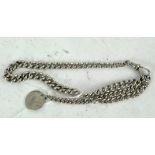 A silver curb link Albert chain, mounted with early Victorian silver four pence, 31g,