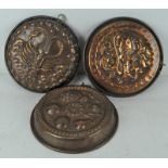 Three Victorian copper moulds, with Fish,