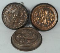 Three Victorian copper moulds, with Fish,