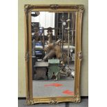 A gilt framed mirror,