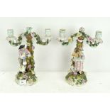 A pair of Meissen style figural candelabras,