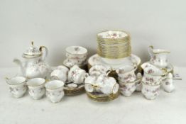 An extensive collection of Paragon 'Victorian Rose' ceramics including a 12 place tea set, teacups,