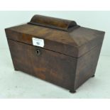 A Victorian mahogany tea caddy of sarcophagus form,