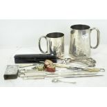 A collection of assorted silver plate, to include two tankards,