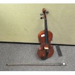 An early Victorian violin and bow (lacking all by one strings)