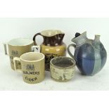 A James Tate and Sons, Wine Merchants, Wells 1911 coronation jug and two Bulmers mugs,