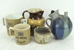 A James Tate and Sons, Wine Merchants, Wells 1911 coronation jug and two Bulmers mugs,