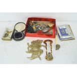 A selection of assorted costume jewellery including necklaces, brooches,