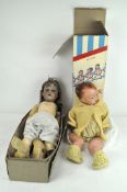 A vintage Pedigree doll with box (damages),