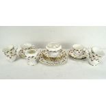 A Crown Staffordshire six piece tea set, rose decoration with gilt rims, comprising tea cups,