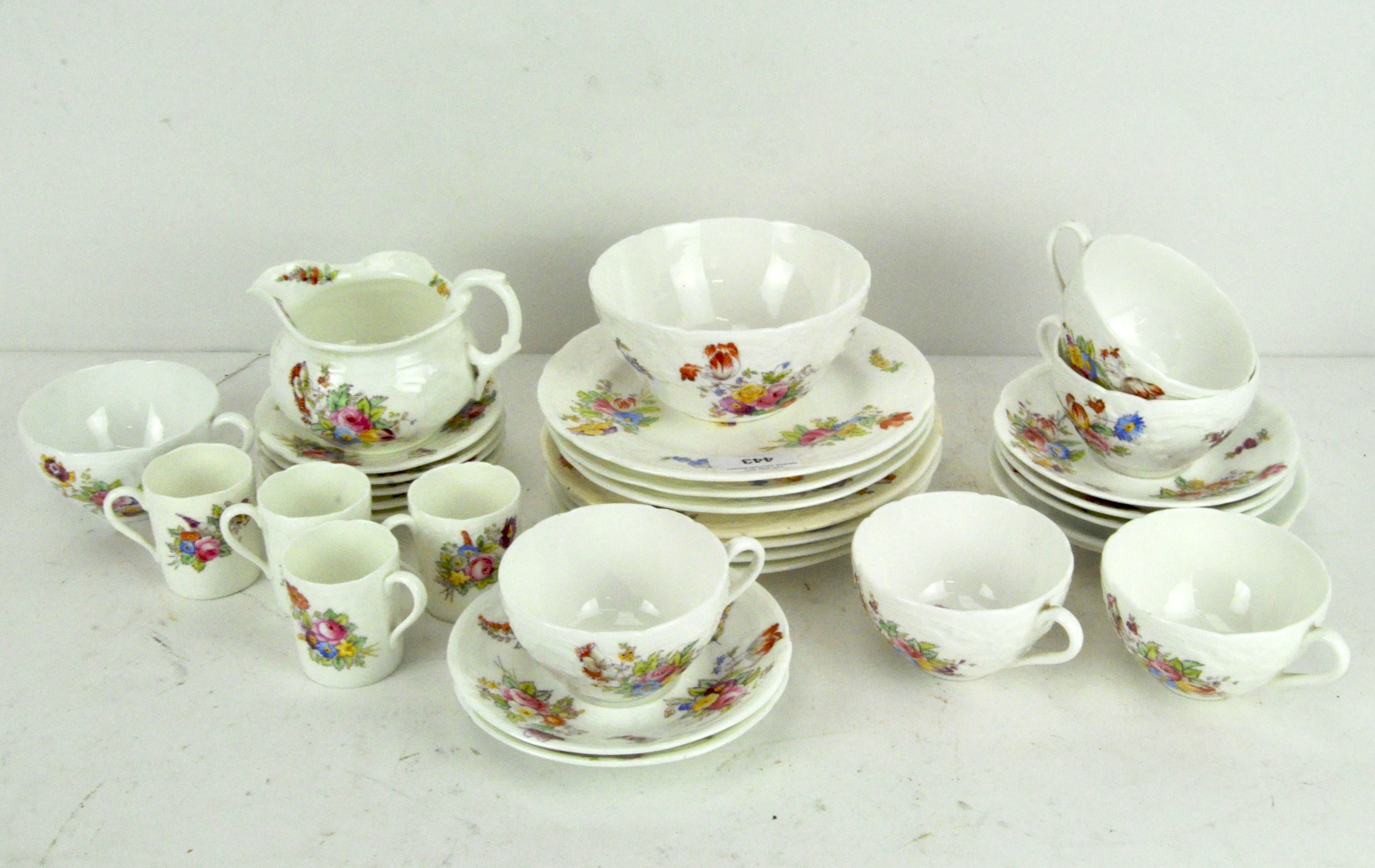 A floral Coalport coffee set, including coffee cans, plates,