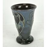 A Brannam Barum, Devon vase or beaker, made for Liberty & Co, with tube lined decoration,