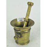 An early bronzed pestle and mortar,