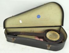 A vintage banjo/ukelele by Lew Stern,