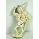 A Crown Devon wall plaque of a Swiss hiker, by Kathleen Parsons, in white,