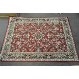 A Belgian machine made Persian style rug,