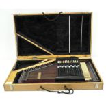 An "auto harp" in original fitted box,