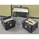 Three cases of vinyl records and albums,