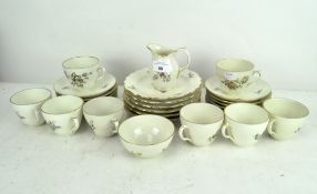 A Royal Copenhagen eight piece tea set, comprising teacups, saucers, side plates, milk jug,