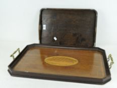 A mahogany serving tray with inlaid decoration, together with an oak example,