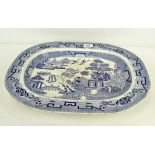 A Staffordshire pottery 'Willow' pattern blue and white meat dish,