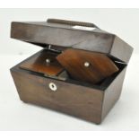 A 19th century Mahogany tea caddy of sarcophagus form,