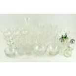 A collection of assorted glassware, including cut glass drinking glasses, in assorted sizes,