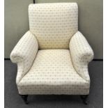 A large upholstered armchair,