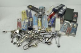 An extensive collection of commemorative teaspoons, mostly silver plated or chrome,