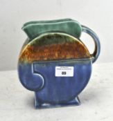 A Beswick Art Deco jug, no 125, stamped mark to base,