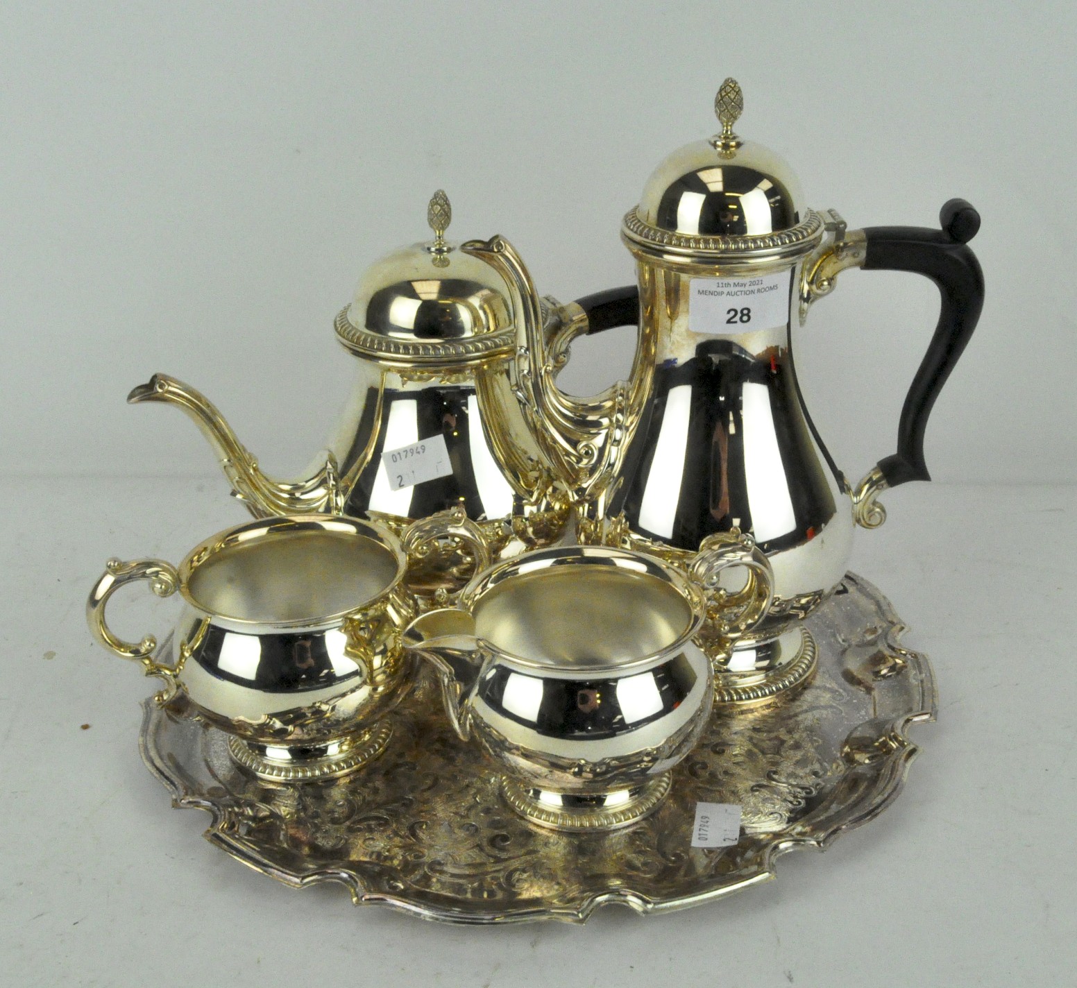 A Barker Ellis silver plated four piece tea set on tray