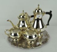 A Barker Ellis silver plated four piece tea set on tray