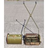 A vintage JP Maxees manual lawn mower,