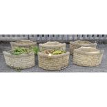 Assorted semi-circular flower-pots,