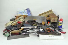 A collection of tools and art equipment