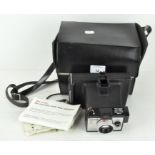 A Polaroid Square Shooter 2 Land camera,