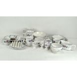 A BHS Priory Ware part service including dinner plates, tea cups, napkins,