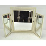 A white and gilt framed three fold dressing table mirror,
