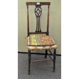 A Victorian walnut and inlaid nursing chair,