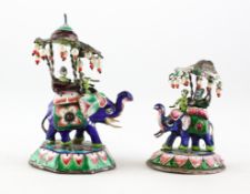 Two Indian enamelled and white metal-mounted model of elephants,