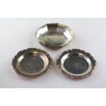 Two silver pin dishes, together with another silver dish, the two hallmarked for Birmingham 1954,