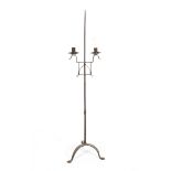 A wrought iron twin candlestick, late 19th/early 20th century,