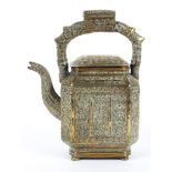 A Middle Eastern or Indian brass teapot and cover, probably 19th century,